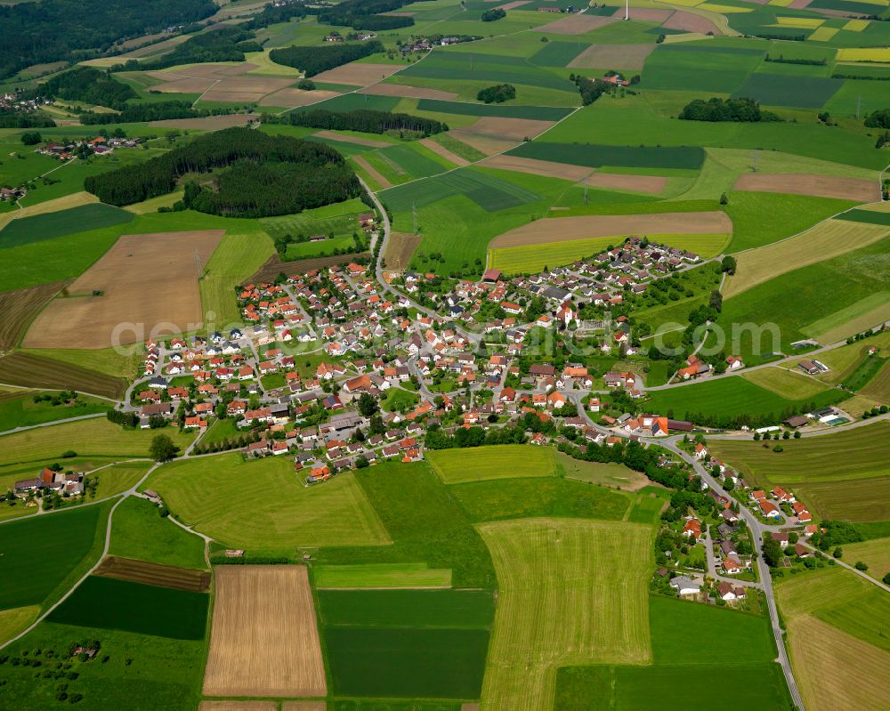 Mittelbuch from above - Agricultural land and field boundaries surround the settlement area of the village in Mittelbuch in the state Baden-Wuerttemberg, Germany