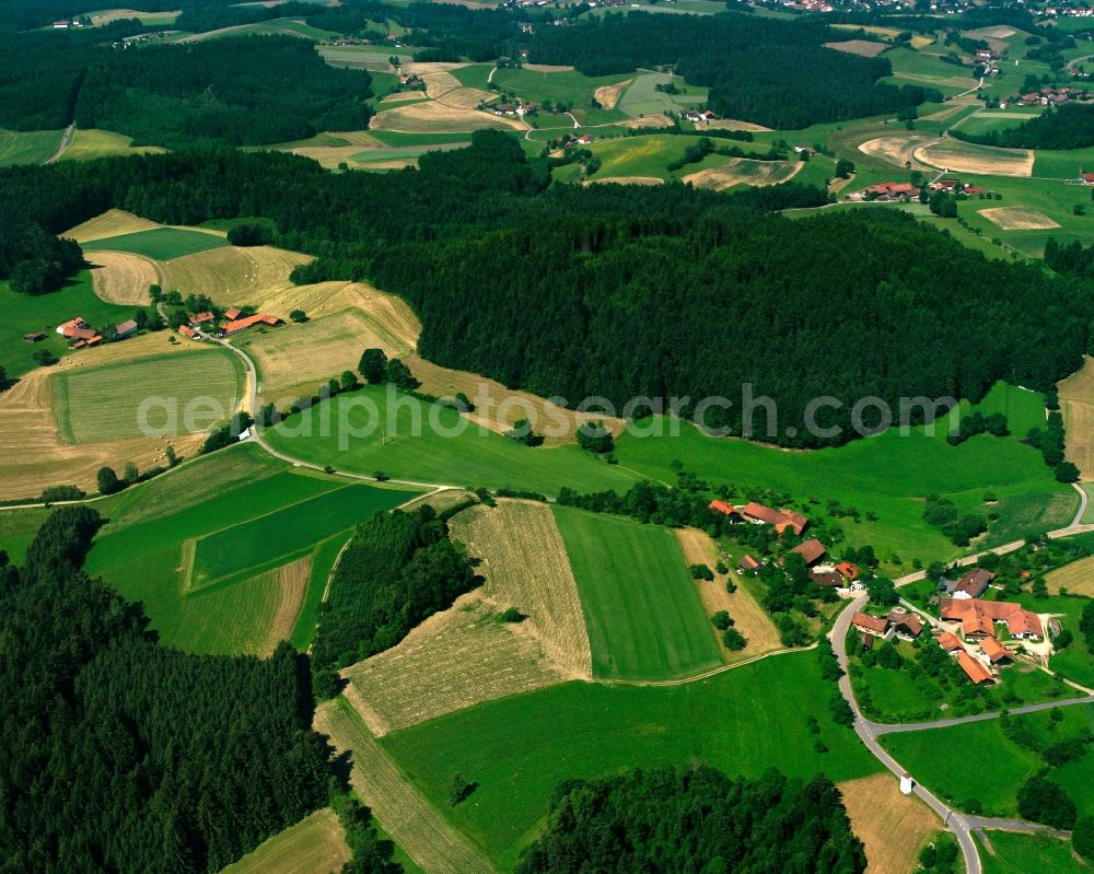 Aerial image Mitterkogl - Agricultural land and field boundaries surround the settlement area of the village in Mitterkogl in the state Bavaria, Germany