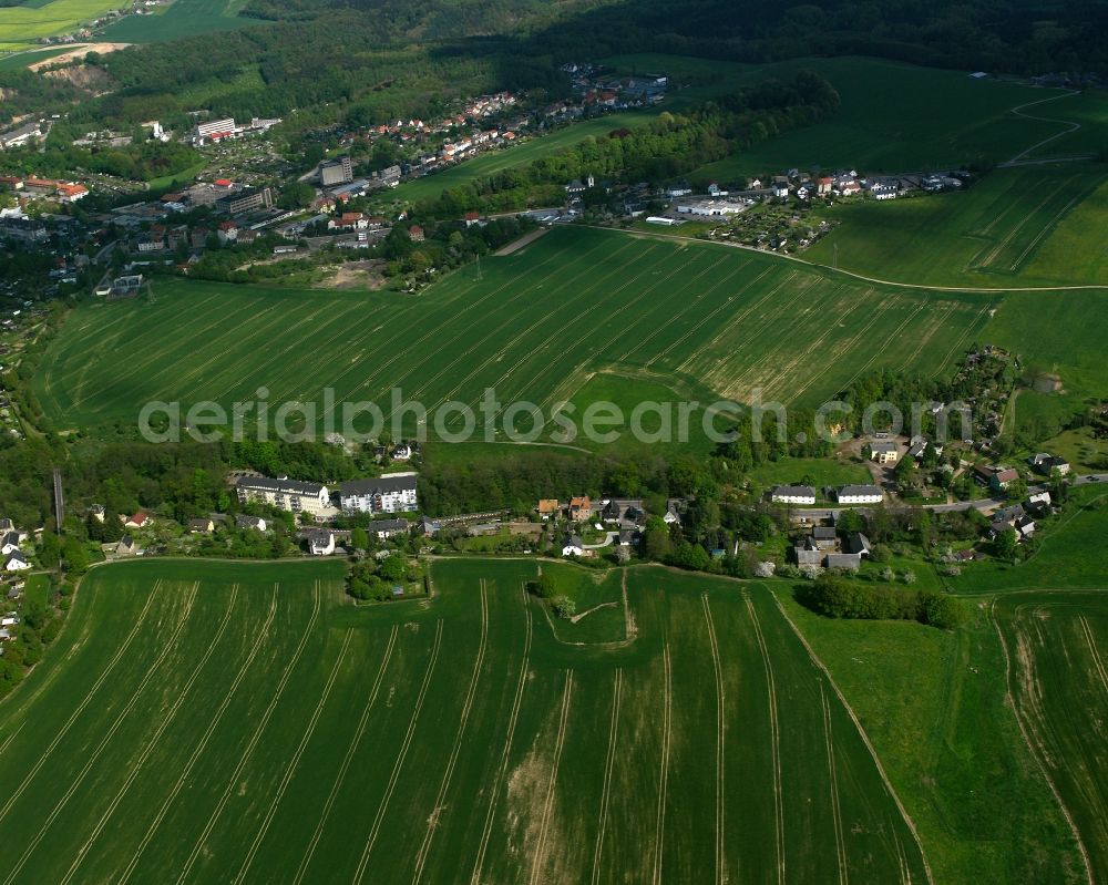 Aerial image Mittweida - Agricultural land and field boundaries surround the settlement area of the village in Mittweida in the state Saxony, Germany