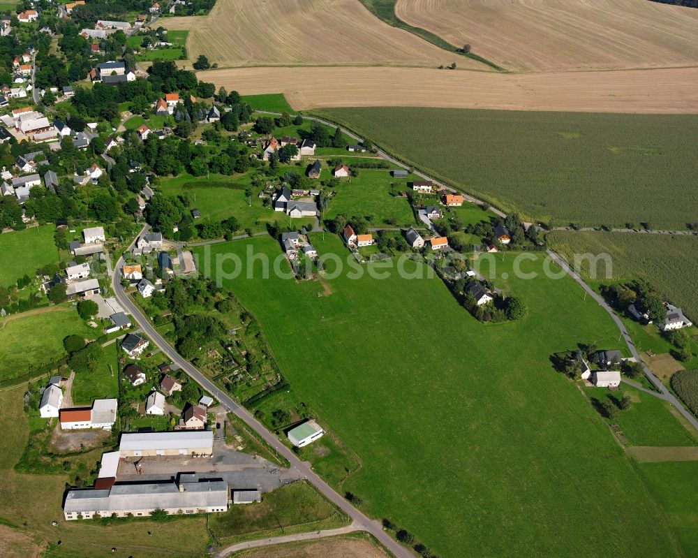 Aerial image Mobendorf - Agricultural land and field boundaries surround the settlement area of the village in Mobendorf in the state Saxony, Germany