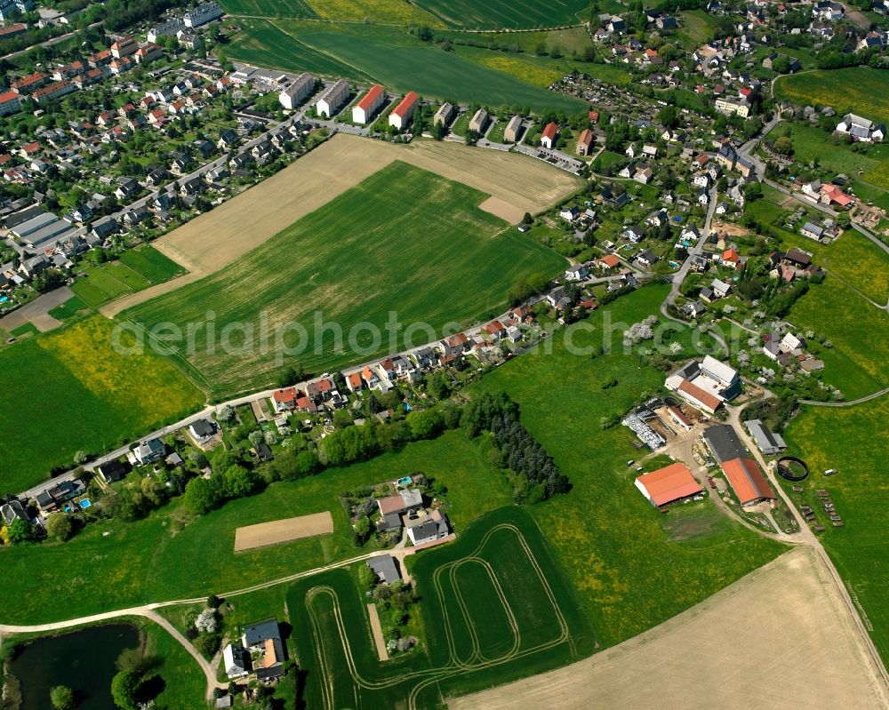 Aerial image Mohsdorf - Agricultural land and field boundaries surround the settlement area of the village in Mohsdorf in the state Saxony, Germany