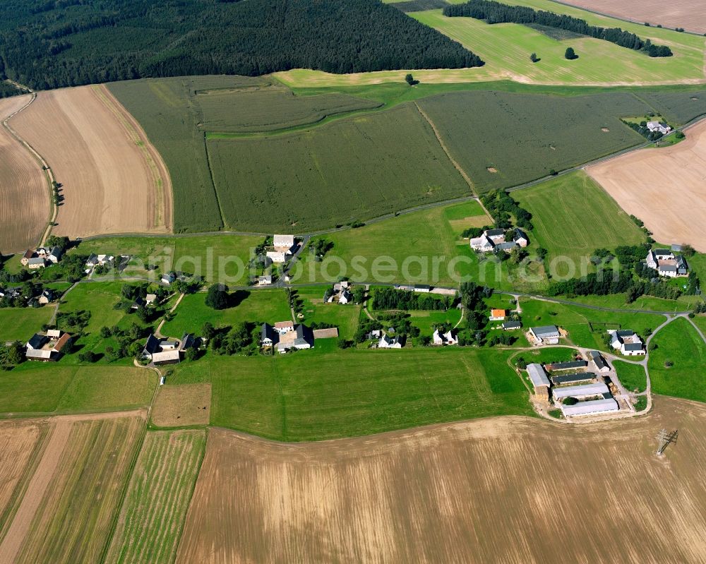 Aerial image Moosheim - Agricultural land and field boundaries surround the settlement area of the village in Moosheim in the state Saxony, Germany