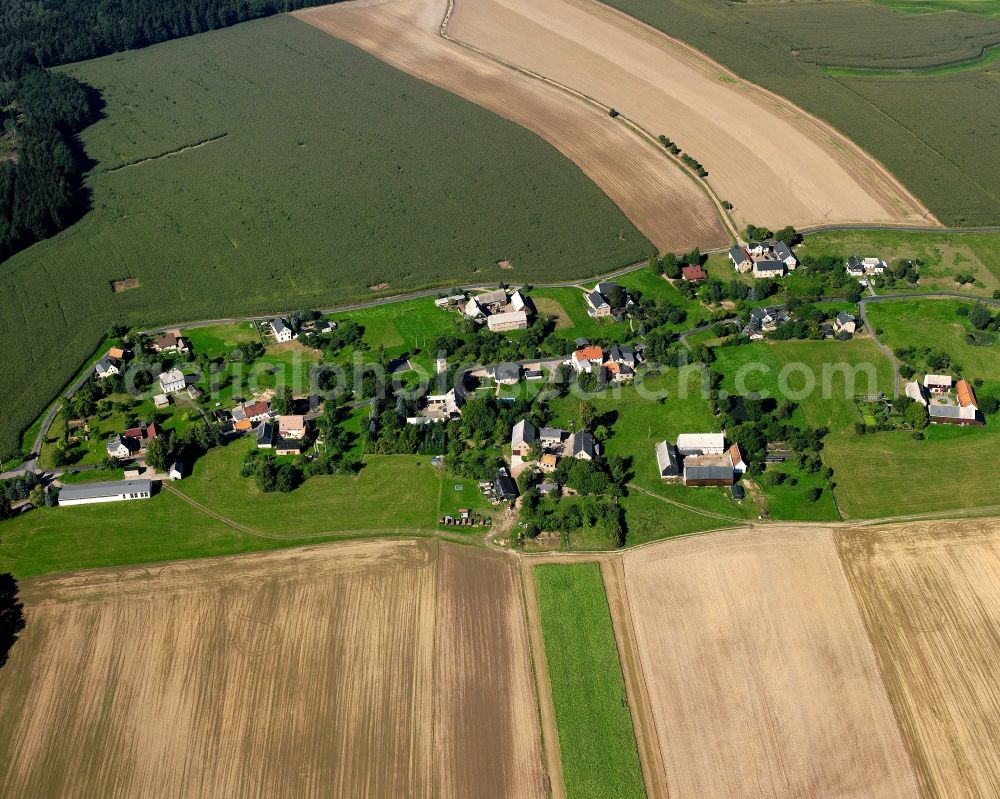 Aerial photograph Moosheim - Agricultural land and field boundaries surround the settlement area of the village in Moosheim in the state Saxony, Germany