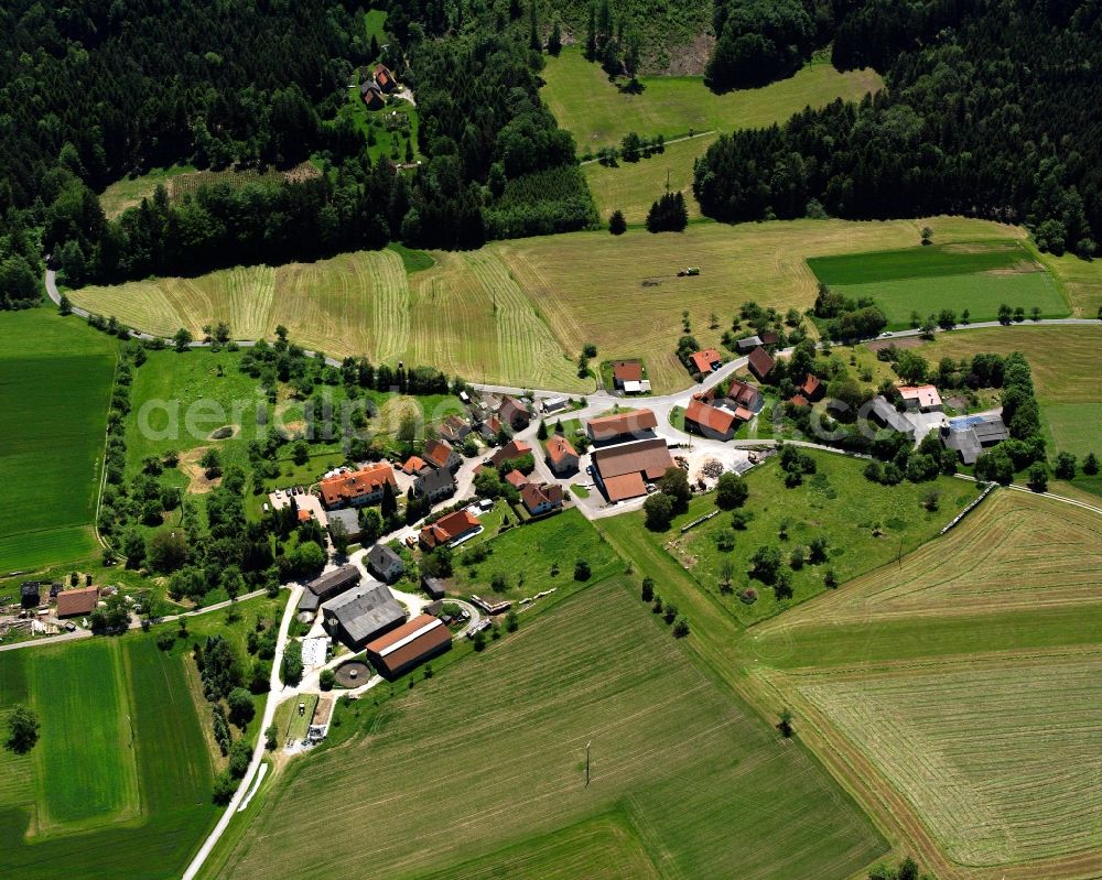 Aerial image Morbach - Agricultural land and field boundaries surround the settlement area of the village in Morbach in the state Baden-Wuerttemberg, Germany