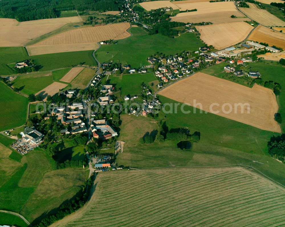 Moschwitz from above - Agricultural land and field boundaries surround the settlement area of the village in Moschwitz in the state Thuringia, Germany