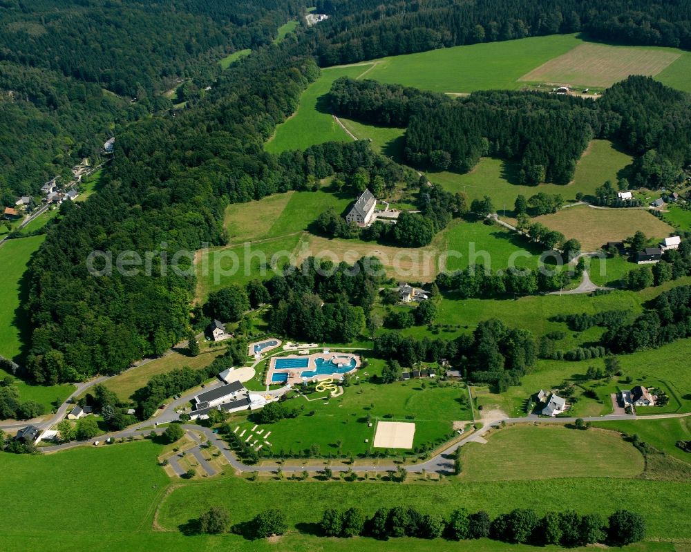 Aerial image Mulda/Sachsen - Agricultural land and field boundaries surround the settlement area of the village in Mulda/Sachsen in the state Saxony, Germany