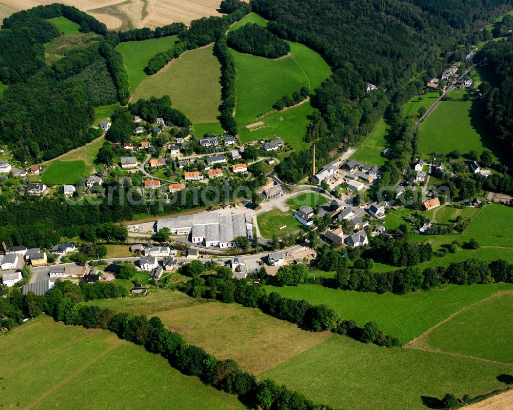 Aerial photograph Mulda/Sachsen - Agricultural land and field boundaries surround the settlement area of the village in Mulda/Sachsen in the state Saxony, Germany