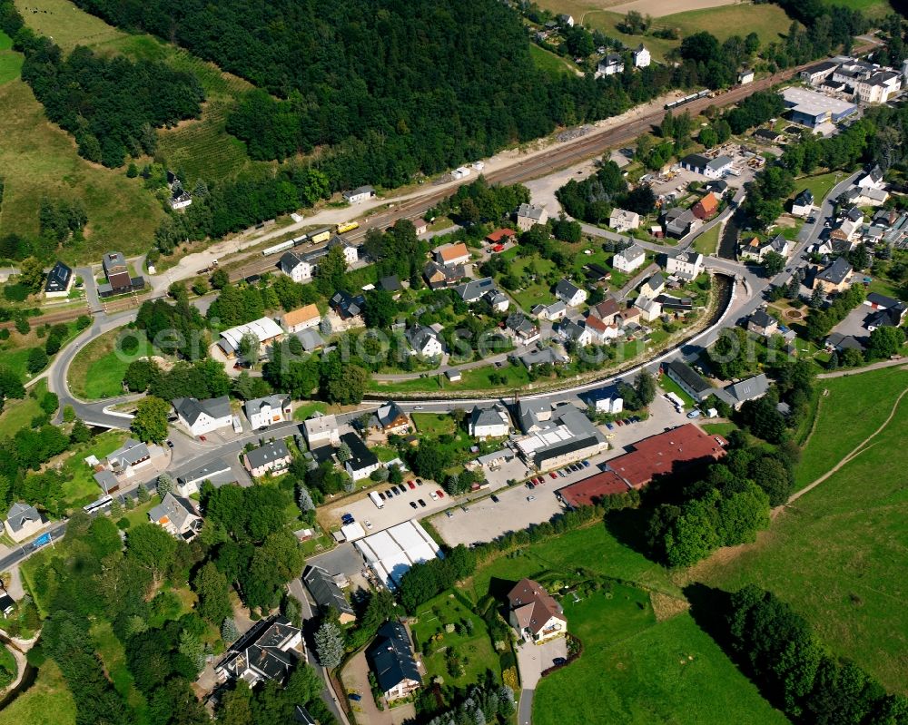 Aerial image Mulda/Sachsen - Agricultural land and field boundaries surround the settlement area of the village in Mulda/Sachsen in the state Saxony, Germany