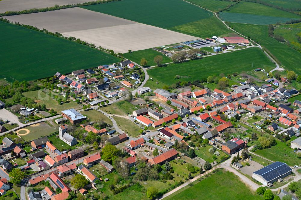 Aerial image Nahrstedt - Agricultural land and field boundaries surround the settlement area of the village in Nahrstedt in the state Saxony-Anhalt, Germany