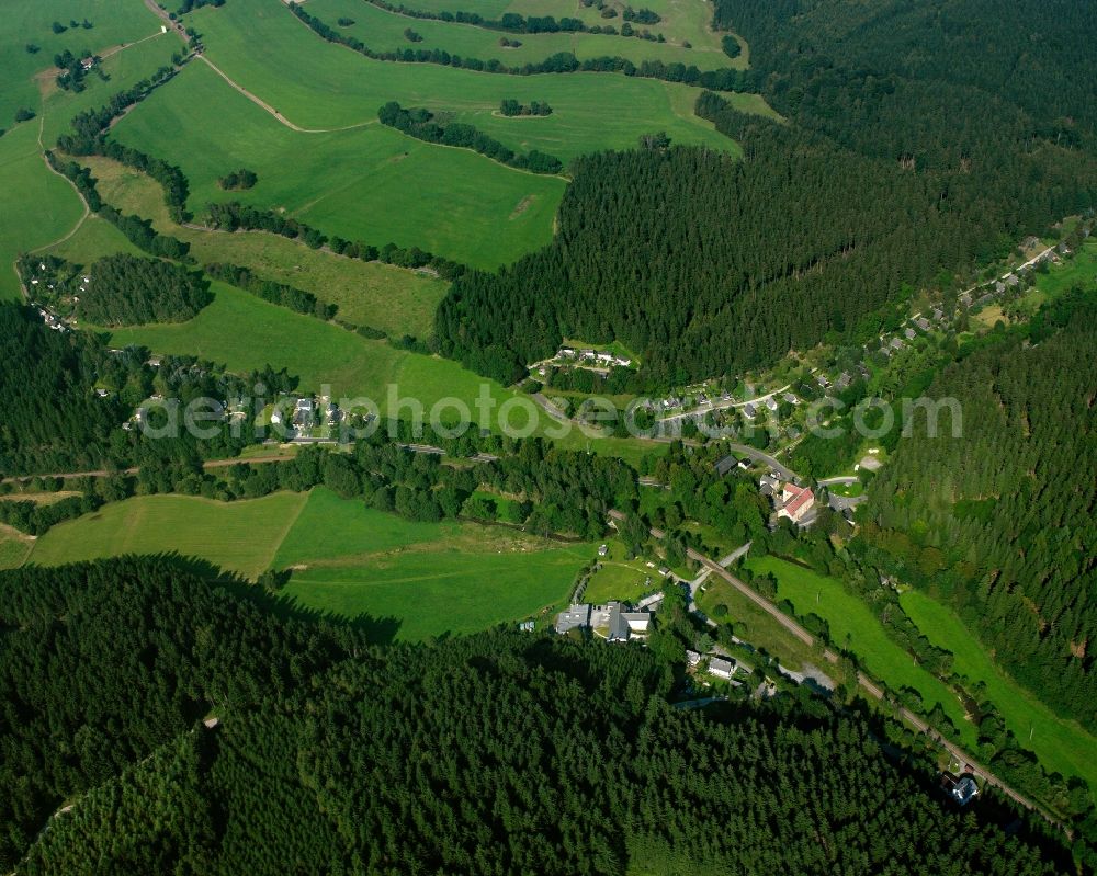 Nassau from above - Agricultural land and field boundaries surround the settlement area of the village in Nassau in the state Saxony, Germany