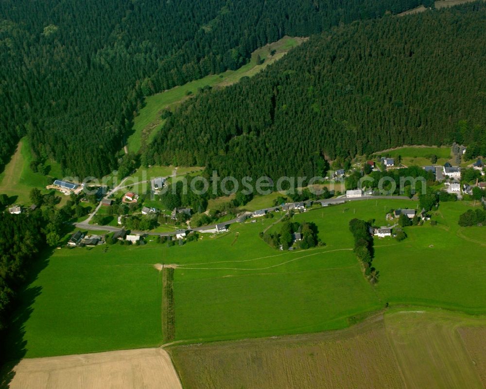 Aerial photograph Nassau - Agricultural land and field boundaries surround the settlement area of the village in Nassau in the state Saxony, Germany