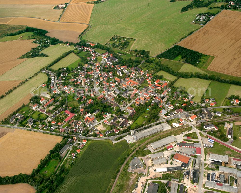 Aerial image Nauendorf - Agricultural land and field boundaries surround the settlement area of the village in Nauendorf in the state Thuringia, Germany