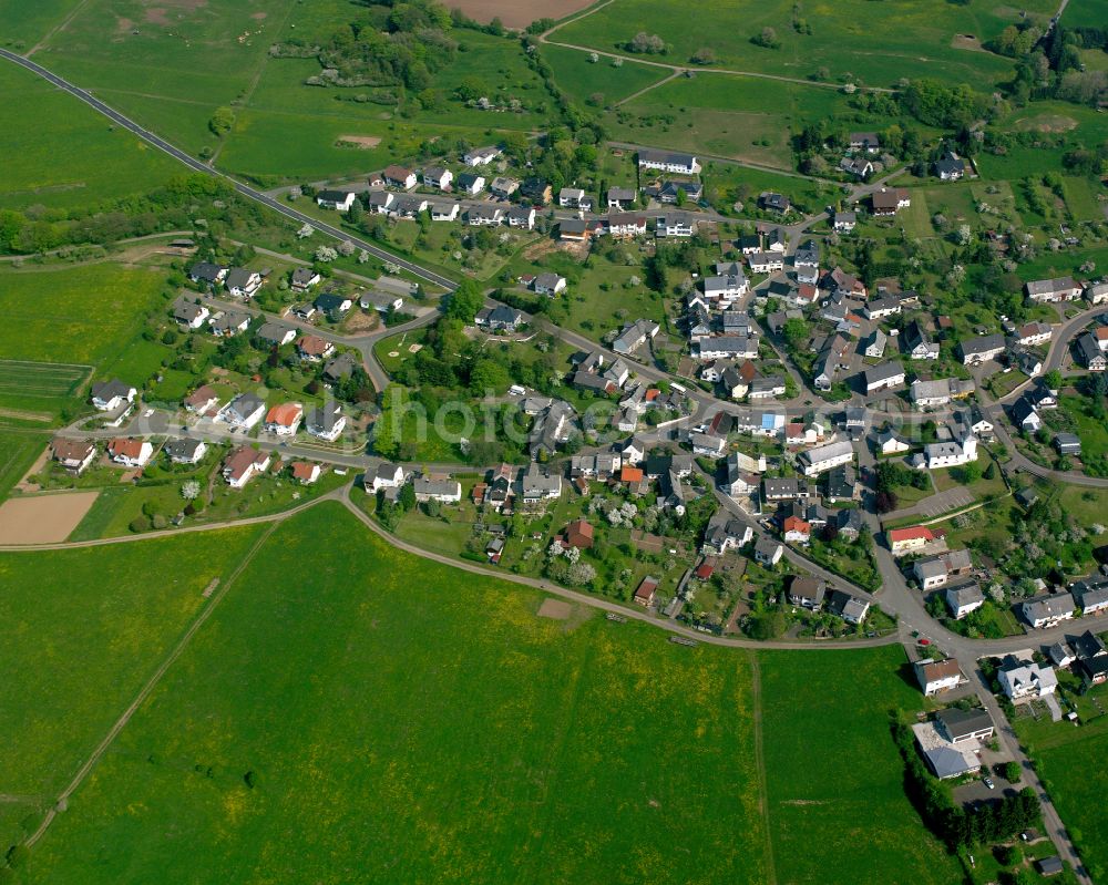 Aerial image Nenderoth - Agricultural land and field boundaries surround the settlement area of the village in Nenderoth in the state Hesse, Germany