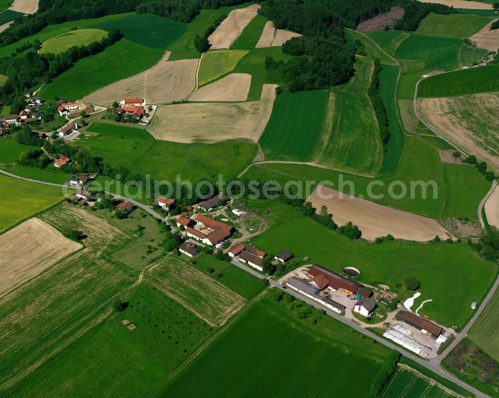 Aerial image Neudau - Agricultural land and field boundaries surround the settlement area of the village in Neudau in the state Bavaria, Germany