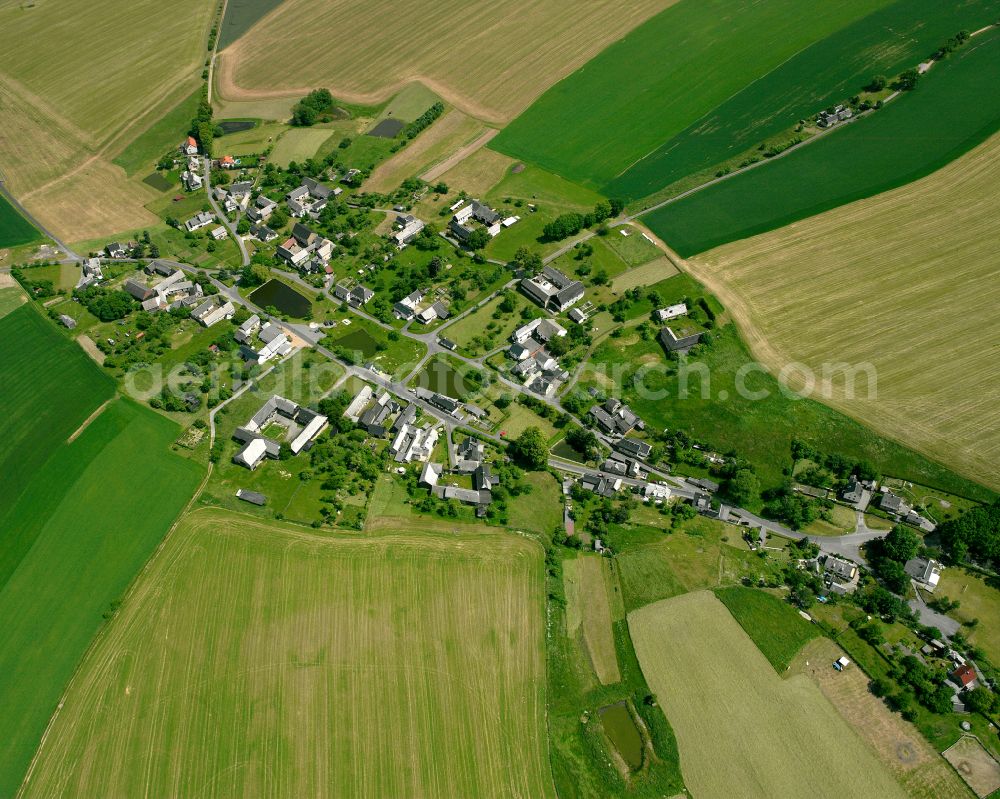 Neugernsdorf from above - Agricultural land and field boundaries surround the settlement area of the village in Neugernsdorf in the state Thuringia, Germany