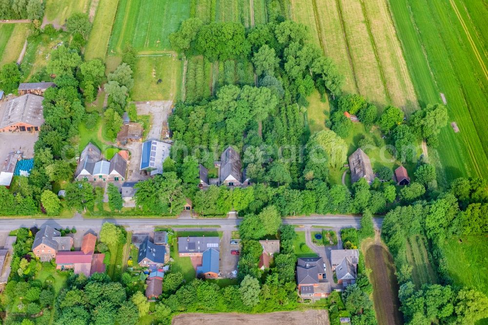 Engelschoff from above - Agricultural land and field boundaries surround the settlement area of the village in Neuland in Engelschoff in the state Lower Saxony, Germany