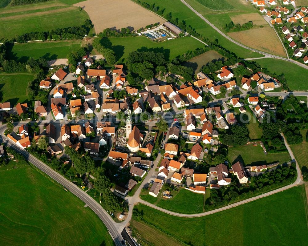 Aerial image Neunstetten - Agricultural land and field boundaries surround the settlement area of the village in Neunstetten in the state Bavaria, Germany