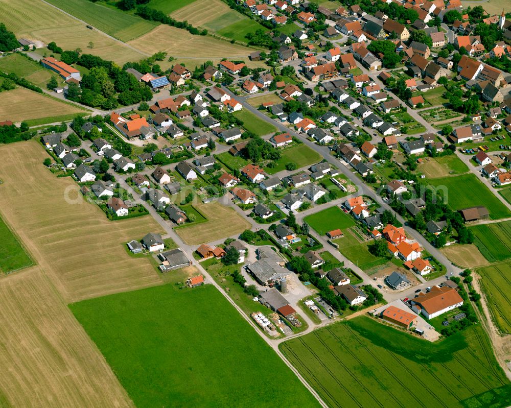 Aerial photograph Neustetten - Agricultural land and field boundaries surround the settlement area of the village in Neustetten in the state Baden-Wuerttemberg, Germany