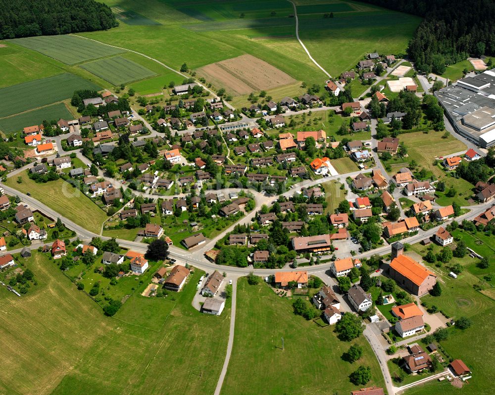 Aerial image Neuweiler - Agricultural land and field boundaries surround the settlement area of the village in Neuweiler in the state Baden-Wuerttemberg, Germany