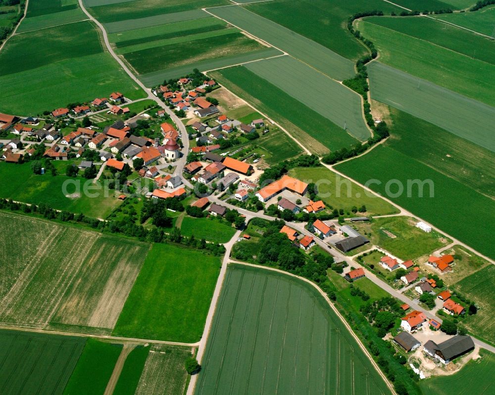 Aerial image Niederachdorf - Agricultural land and field boundaries surround the settlement area of the village in Niederachdorf in the state Bavaria, Germany