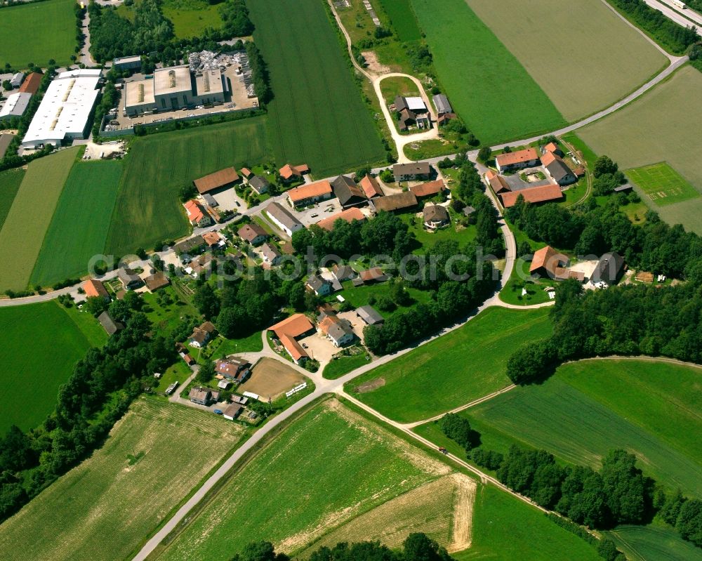 Aerial photograph Niedermenach - Agricultural land and field boundaries surround the settlement area of the village in Niedermenach in the state Bavaria, Germany