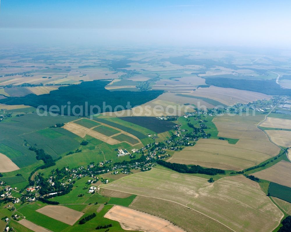 Niederrossau from the bird's eye view: Agricultural land and field boundaries surround the settlement area of the village in Niederrossau in the state Saxony, Germany