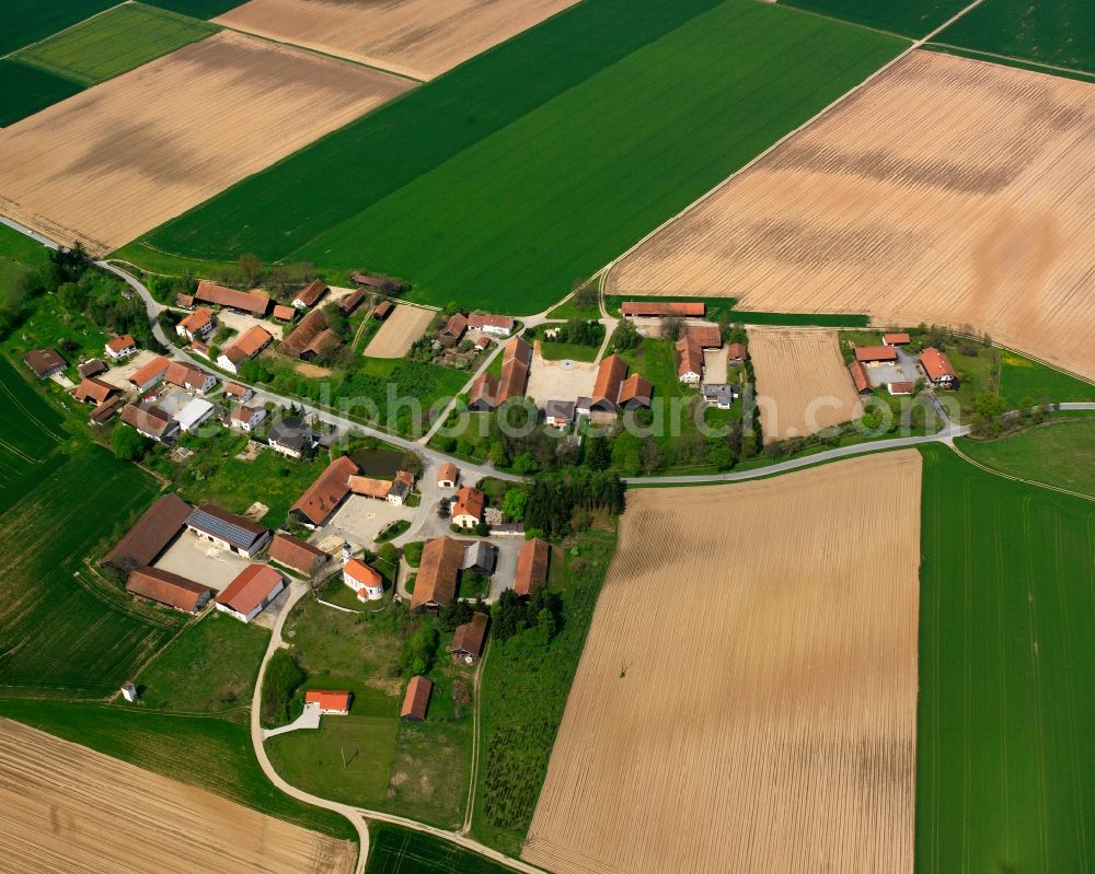 Niederschneiding from above - Agricultural land and field boundaries surround the settlement area of the village in Niederschneiding in the state Bavaria, Germany