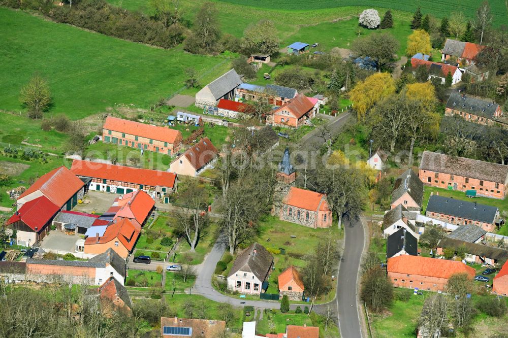 Aerial photograph Niemerlang - Agricultural land and field boundaries surround the settlement area of the village on street Hauptstrasse in Niemerlang in the state Brandenburg, Germany