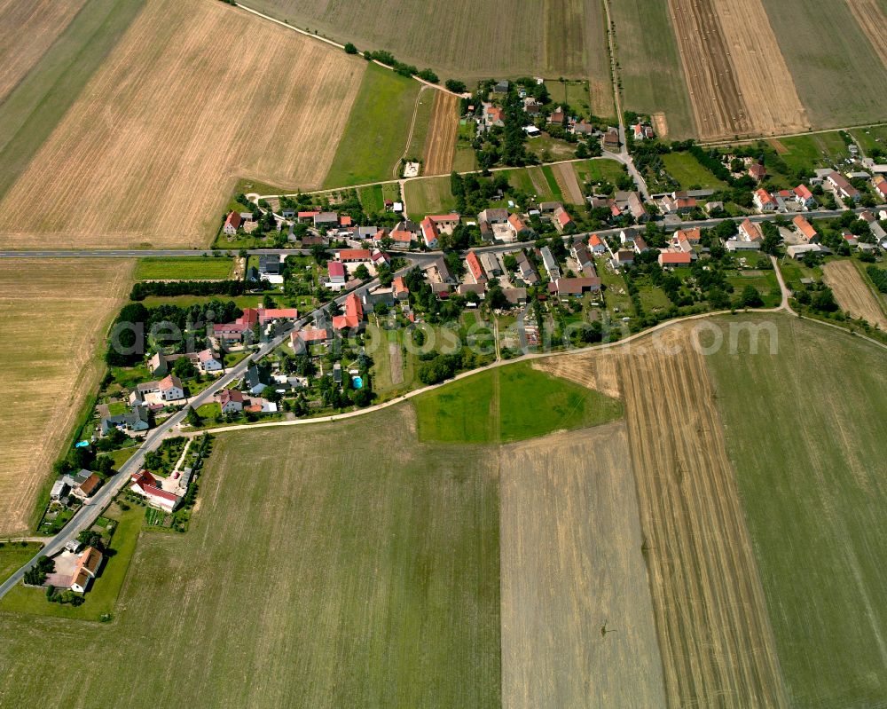 Aerial image Nieska - Agricultural land and field boundaries surround the settlement area of the village in Nieska in the state Saxony, Germany