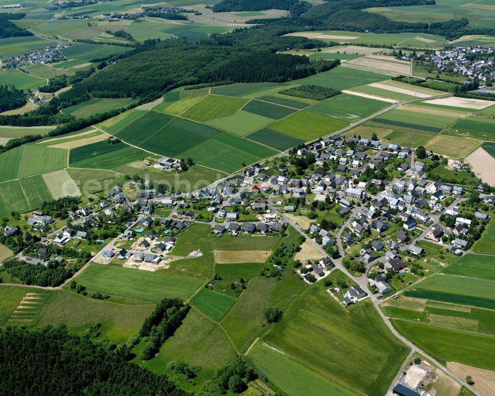 Norath from the bird's eye view: Agricultural land and field boundaries surround the settlement area of the village in Norath in the state Rhineland-Palatinate, Germany