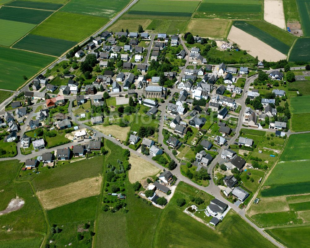 Aerial image Norath - Agricultural land and field boundaries surround the settlement area of the village in Norath in the state Rhineland-Palatinate, Germany