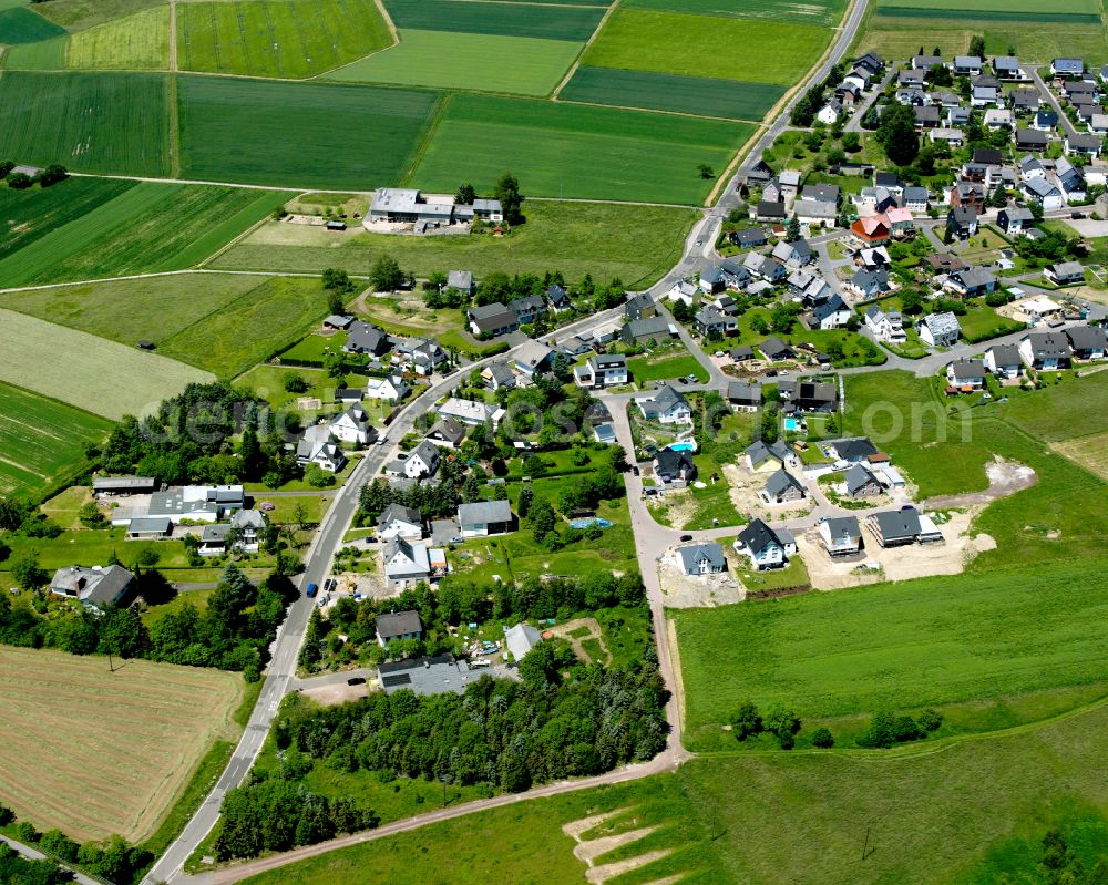 Aerial photograph Norath - Agricultural land and field boundaries surround the settlement area of the village in Norath in the state Rhineland-Palatinate, Germany