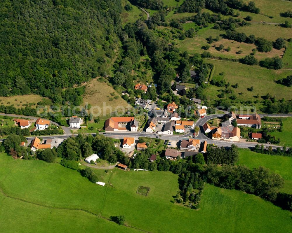 Ober-Gersprenz from the bird's eye view: Agricultural land and field boundaries surround the settlement area of the village in Ober-Gersprenz in the state Hesse, Germany