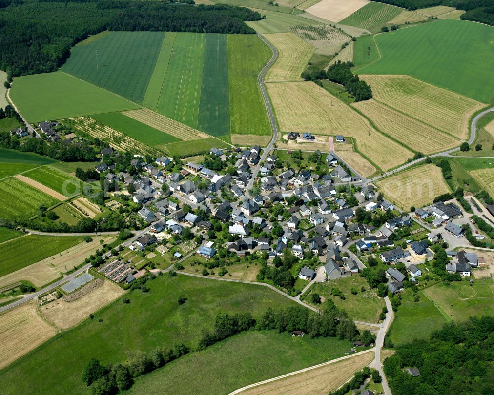 Aerial image Ober Kostenz - Agricultural land and field boundaries surround the settlement area of the village in Ober Kostenz in the state Rhineland-Palatinate, Germany