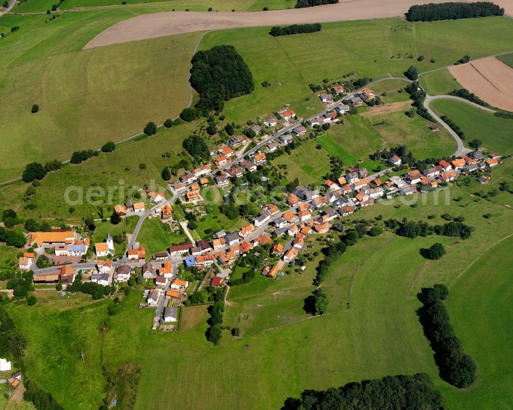 Aerial image Ober-Mossau - Agricultural land and field boundaries surround the settlement area of the village in Ober-Mossau in the state Hesse, Germany