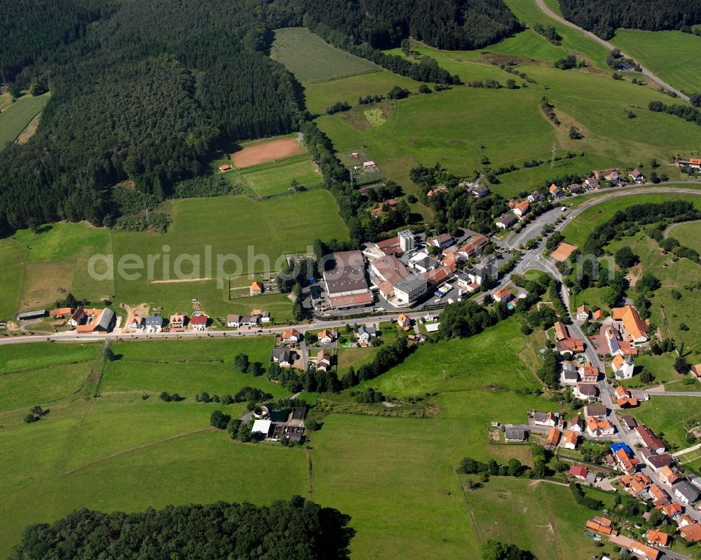 Aerial photograph Ober-Mossau - Agricultural land and field boundaries surround the settlement area of the village in Ober-Mossau in the state Hesse, Germany