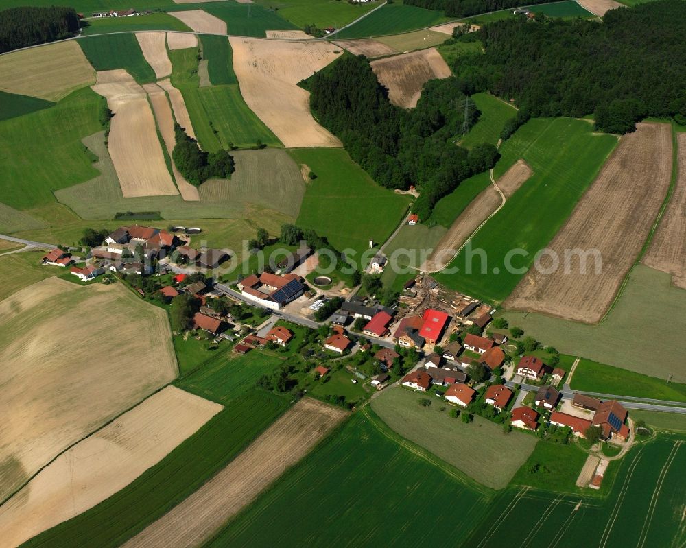 Oberbirnbach from the bird's eye view: Agricultural land and field boundaries surround the settlement area of the village in Oberbirnbach in the state Bavaria, Germany