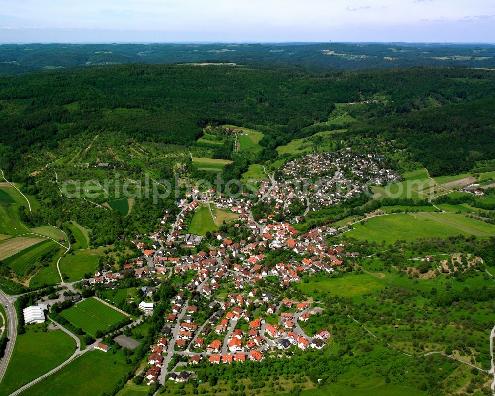 Oberbrüden from above - Agricultural land and field boundaries surround the settlement area of the village in Oberbrüden in the state Baden-Wuerttemberg, Germany