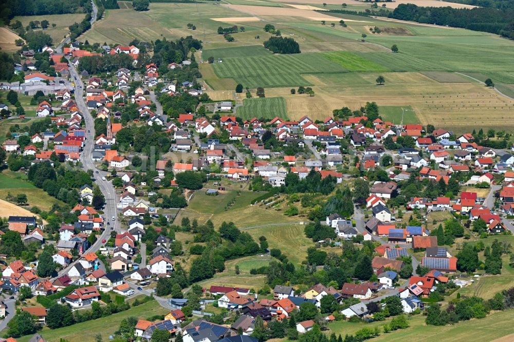 Aerial image Oberdielbach - Agricultural land and field boundaries surround the settlement area of the village in Oberdielbach in the state Baden-Wuerttemberg, Germany