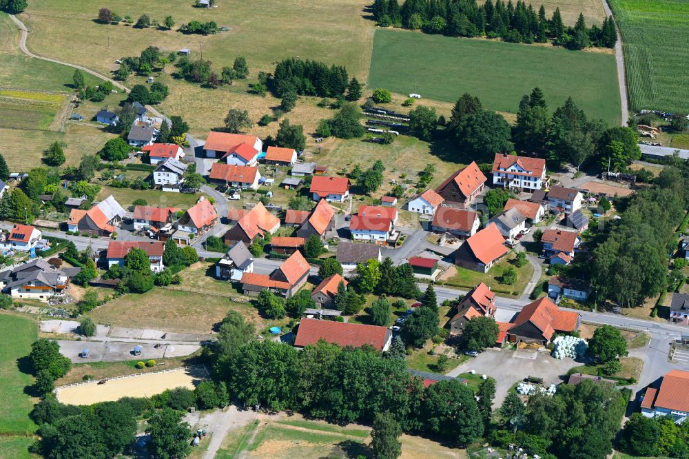 Oberdielbach from above - Agricultural land and field boundaries surround the settlement area of the village in Oberdielbach in the state Baden-Wuerttemberg, Germany