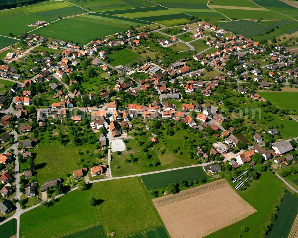 Aerial image Oberhaugstett - Agricultural land and field boundaries surround the settlement area of the village in Oberhaugstett in the state Baden-Wuerttemberg, Germany