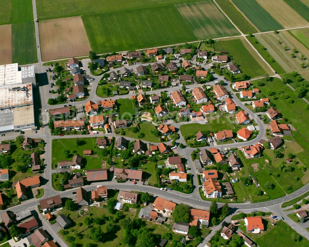 Oberhaugstett from above - Agricultural land and field boundaries surround the settlement area of the village in Oberhaugstett in the state Baden-Wuerttemberg, Germany