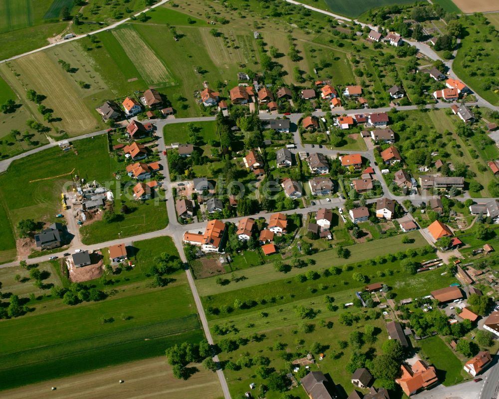 Oberhaugstett from the bird's eye view: Agricultural land and field boundaries surround the settlement area of the village in Oberhaugstett in the state Baden-Wuerttemberg, Germany