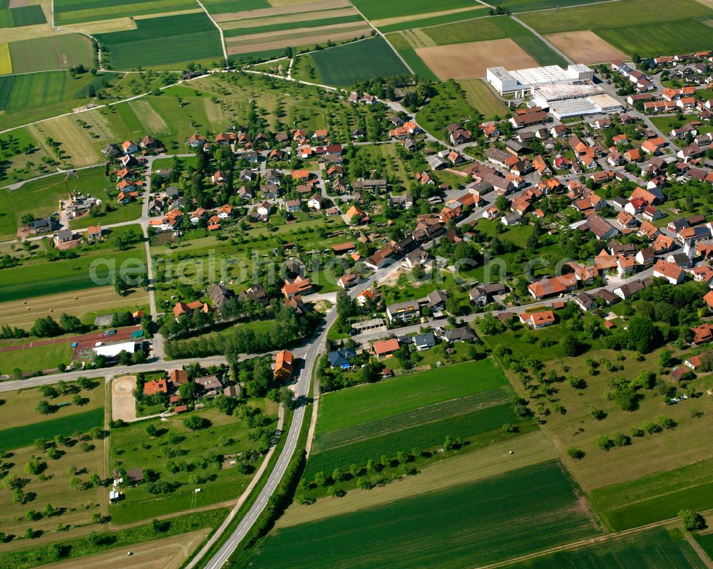 Aerial image Oberhaugstett - Agricultural land and field boundaries surround the settlement area of the village in Oberhaugstett in the state Baden-Wuerttemberg, Germany