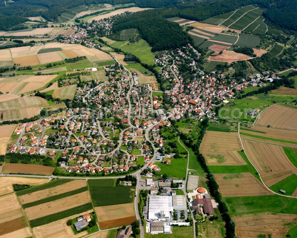 Aerial photograph Oberheinriet - Agricultural land and field boundaries surround the settlement area of the village in Oberheinriet in the state Baden-Wuerttemberg, Germany