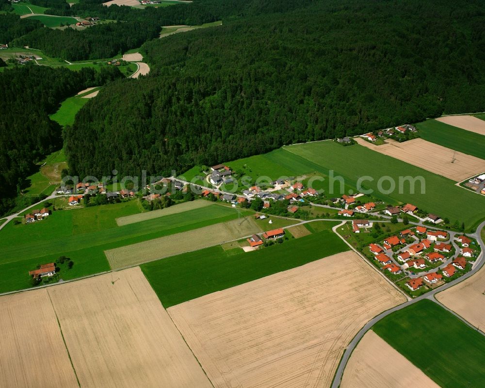 Aerial image Oberjulbach - Agricultural land and field boundaries surround the settlement area of the village in Oberjulbach in the state Bavaria, Germany