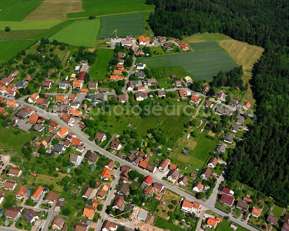 Oberkollbach from above - Agricultural land and field boundaries surround the settlement area of the village in Oberkollbach in the state Baden-Wuerttemberg, Germany