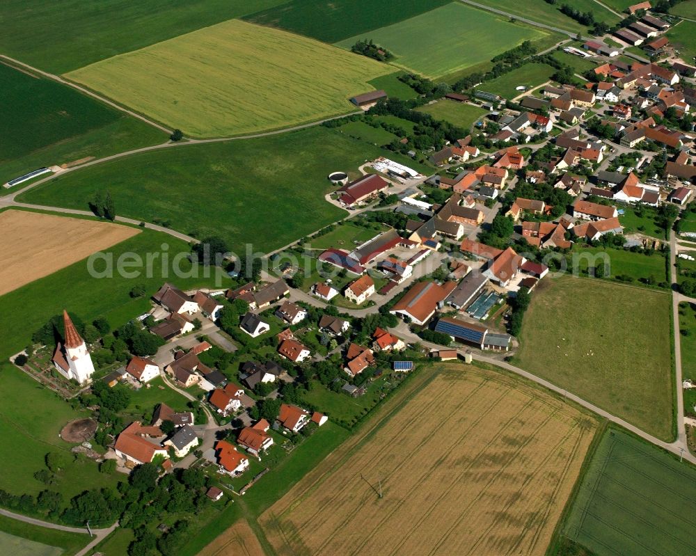 Obermögersheim from the bird's eye view: Agricultural land and field boundaries surround the settlement area of the village in Obermögersheim in the state Bavaria, Germany