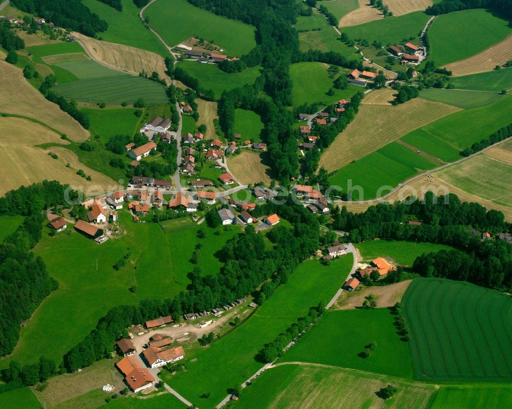 Obermühlbach from above - Agricultural land and field boundaries surround the settlement area of the village in Obermühlbach in the state Bavaria, Germany