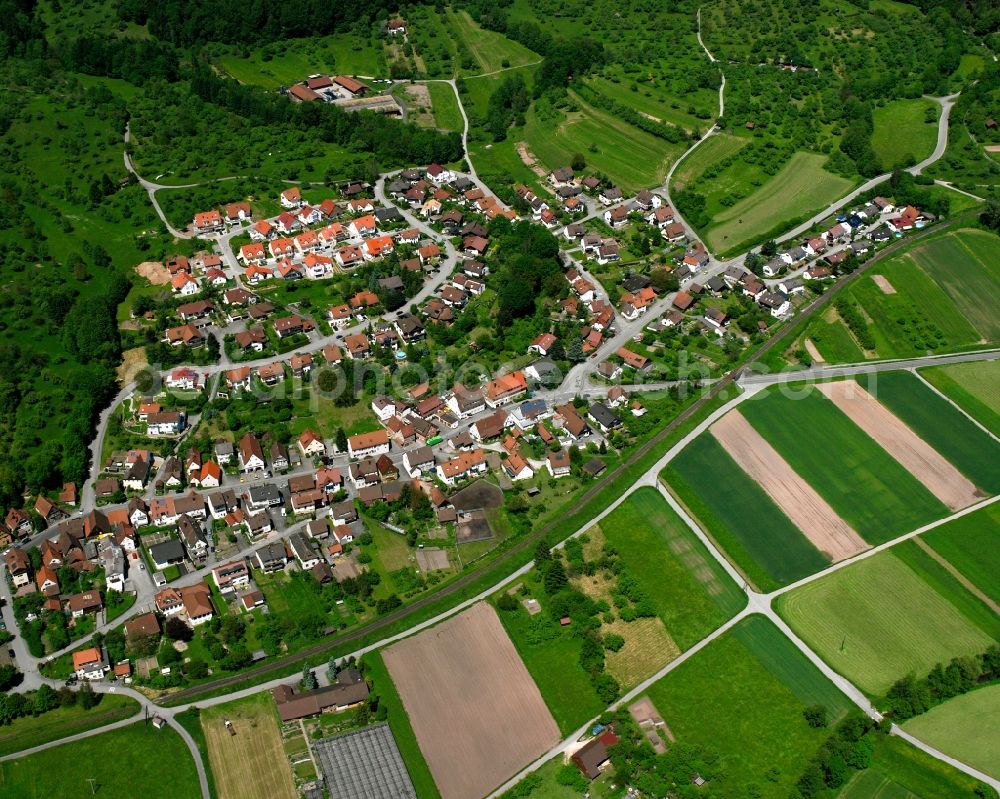 Oberndorf from the bird's eye view: Agricultural land and field boundaries surround the settlement area of the village in Oberndorf in the state Baden-Wuerttemberg, Germany
